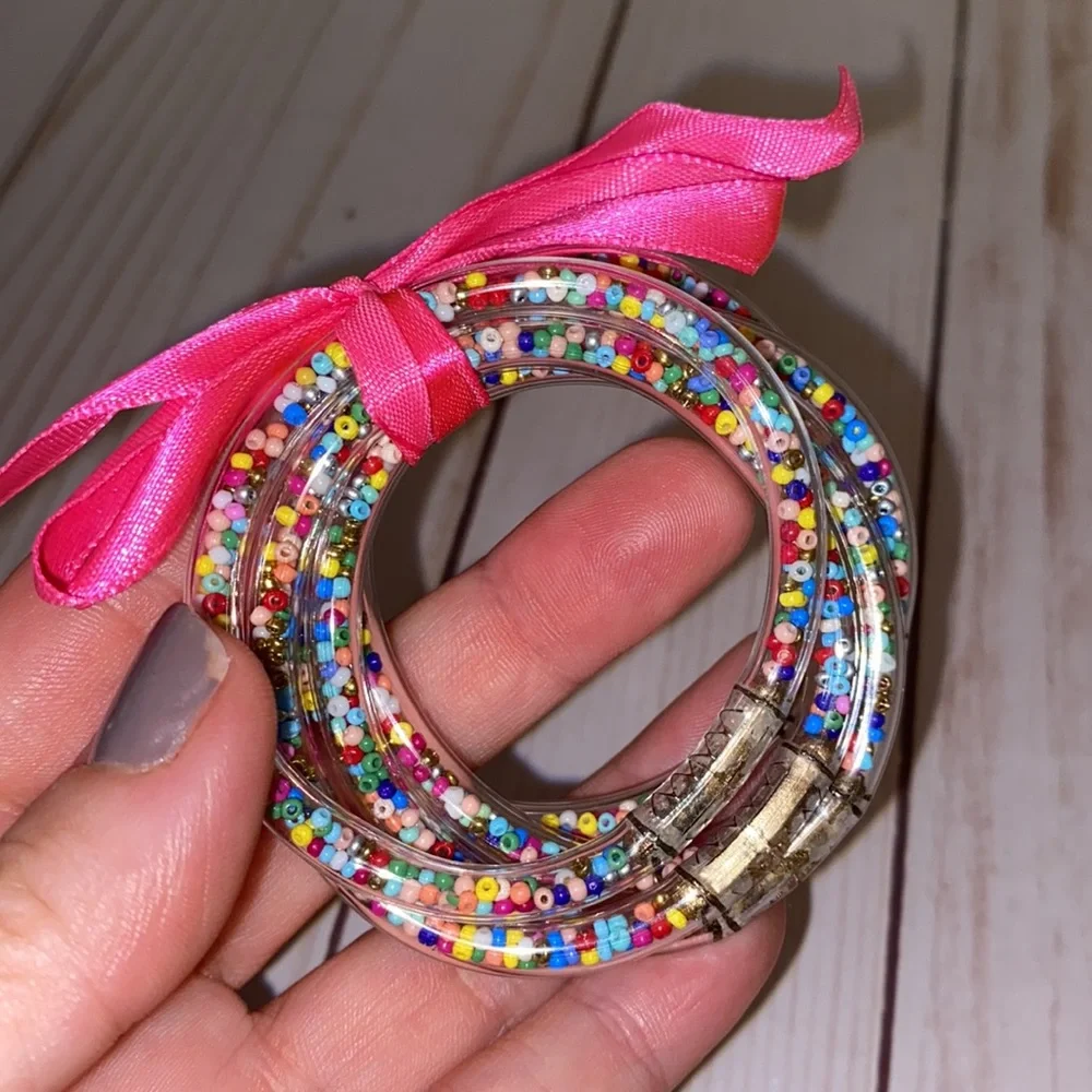 Little girls clear plastic multi colored confetti bracelets